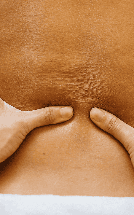Deep tissue massage therapy on upper back and neck muscles at Detroit Massage & Mobility. Relieve muscle tension and improve mobility with expert massage services.